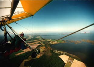 Tandem hang glider on tow.